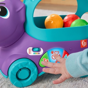 Fisher price hrající dino s vyskakujícími míčky